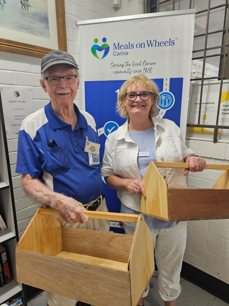 Shed member give toolbox's to meals on wheels